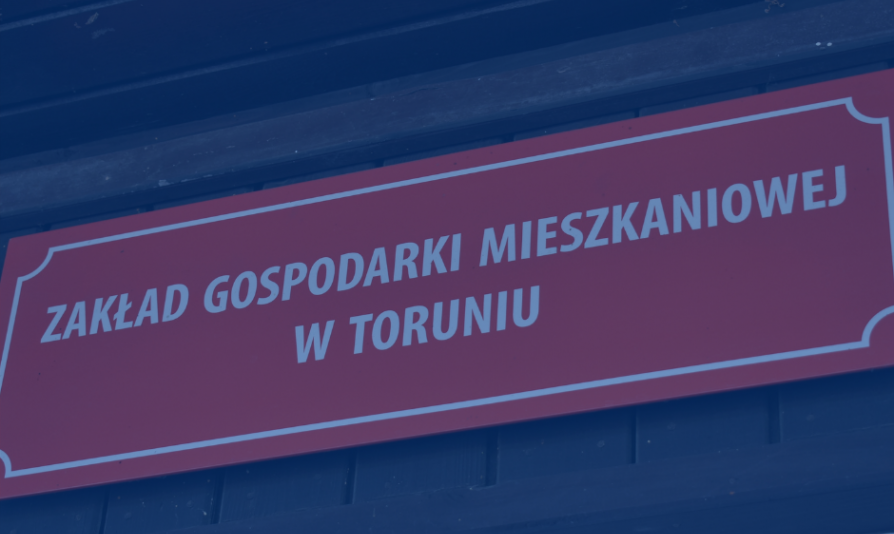 Zdjęcie szyldu Zakładu Gospodarki Mieszkaniowej w Toruniu