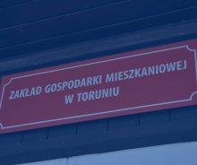 Zdjęcie szyldu Zakładu Gospodarki Mieszkaniowej w Toruniu