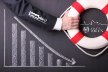 Grafika przedstawia koło ratunkowe z logotypem Miasta Toruń